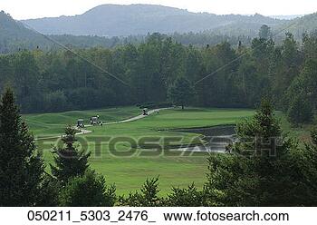 Stock Photo - game, aerial, 
course, competition, 
carts, golf, apr. 
fotosearch - search 
stock photos, 
pictures, images, 
and photo clipart