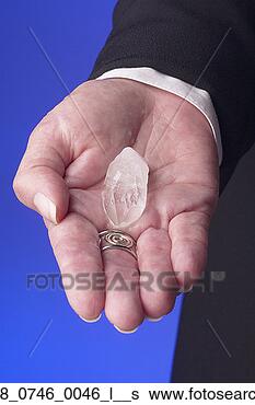 Stock Photo - glass, crystal, 
esoteric, energy, 
danger, hand, 
caucasian. fotosearch 
- search stock 
photos, pictures, 
images, and photo 
clipart