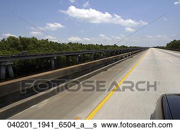 Stock Photo - driving, fender, 
automobile, vehicle, 
front, car. fotosearch 
- search stock 
photos, pictures, 
images, and photo 
clipart