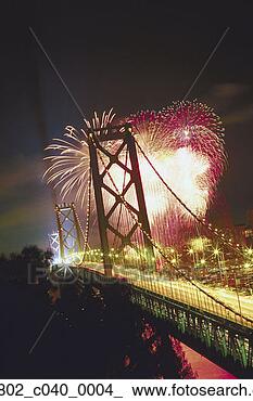 Stock Photo - celebrating, blasting, 
celebrate, bridges, 
bridge, celebration, 
blast. fotosearch 
- search stock 
photos, pictures, 
images, and photo 
clipart