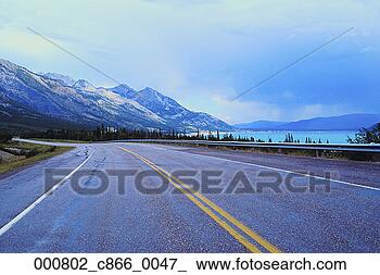 Stock Photo - range, canada, 
mountains, highway, 
alberta, guardrail, 
north america. 
fotosearch - search 
stock photos, 
pictures, images, 
and photo clipart