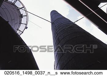 Stock Photo - pipes, abandoned, 
architecture, 
industrial, idle, 
smokestacks, factory. 
fotosearch - search 
stock photos, 
pictures, images, 
and photo clipart