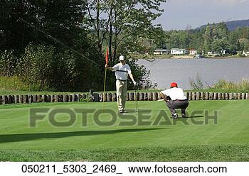 Stock Photo - course, caddie, 
competition, clubs, 
caddy, game, apr. 
fotosearch - search 
stock photos, 
pictures, images, 
and photo clipart