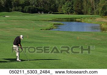 Stock Photo - course, caddie, 
competition, clubs, 
caddy, game, apr. 
fotosearch - search 
stock photos, 
pictures, images, 
and photo clipart