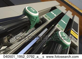 Stock Photo - gas, detail, fuel 
pump, fuel, diagonal, 
gas pump, angle. 
fotosearch - search 
stock photos, 
pictures, images, 
and photo clipart