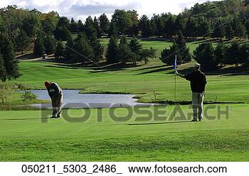Stock Photo - course, caddie, 
competition, clubs, 
caddy, game, apr. 
fotosearch - search 
stock photos, 
pictures, images, 
and photo clipart