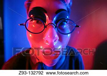Stock Photo - woman behind mask. 
fotosearch - search 
stock photos, 
pictures, images, 
and photo clipart