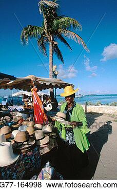 Stock Photo - woman vendor at 
market marigot 
saint martin department 
of guadeloupe. 
fotosearch - search 
stock photos, 
pictures, images, 
and photo clipart
