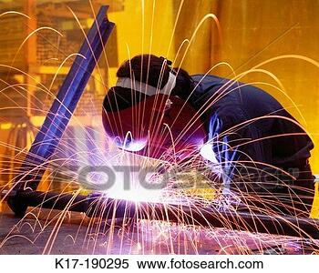Stock Image - welder working 
on bridge support. 
fotosearch - search 
stock photos, 
pictures, images, 
and photo clipart