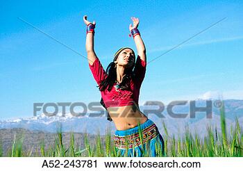 Stock Photography - girl dancing in 
the himalayas 
uttaranchal india. 
fotosearch - search 
stock photos, 
pictures, images, 
and photo clipart