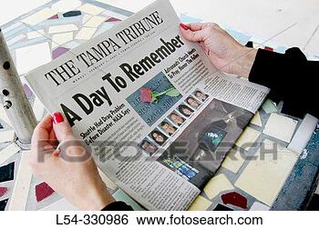 Stock Photo - adult reads about 
space ship columbia 
tragedy. fotosearch 
- search stock 
photos, pictures, 
images, and photo 
clipart