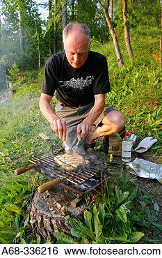 Stock Photo - putting salmon 
on the grill sweden. 
fotosearch - search 
stock photos, 
pictures, images, 
and photo clipart