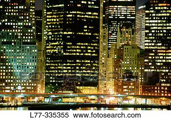 Stock Image - building in downtown 
manhattan at night 
new york city, 
usa. fotosearch 
- search stock 
photos, pictures, 
images, and photo 
clipart
