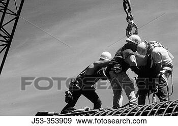 Stock Photograph - ironworkers attaching 
load to crane 
i-880 cypress 
project oakland. 
fotosearch - search 
stock photos, 
pictures, images, 
and photo clipart
