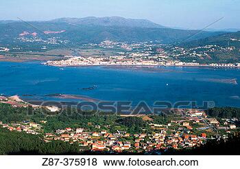 Stock Photo - miño river estuary 
and portugal at 
background a guarda 
village. fotosearch 
- search stock 
photos, pictures, 
images, and photo 
clipart