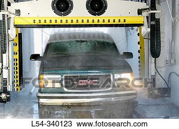 Stock Photo - auto being washed 
with touchless 
system. fotosearch 
- search stock 
photos, pictures, 
images, and photo 
clipart