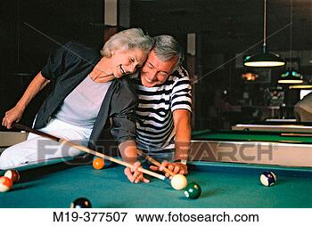 Picture - couple shooting 
pool (billards). 
fotosearch - search 
stock photos, 
pictures, images, 
and photo clipart