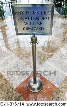 Stock Photo - ´any items left 
unattended will 
be removed´ warning 
sign. fotosearch 
- search stock 
photos, pictures, 
images, and photo 
clipart