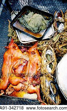 Stock Photo - roasted piglets 
and other dishes 
for the sunday 
´hi-maa´ (festival. 
fotosearch - search 
stock photos, 
pictures, images, 
and photo clipart