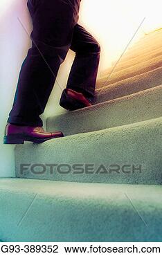 Stock Photo - person walking 
up stairs. fotosearch 
- search stock 
photos, pictures, 
images, and photo 
clipart