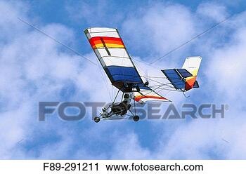 Stock Photography - ultralight aircraft 
against blue sky 
ferndale washington, 
usa. fotosearch 
- search stock 
photos, pictures, 
images, and photo 
clipart