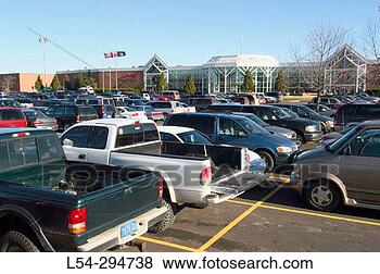 Stock Photo - vehicles filling 
parking lots outside 
a mall. fotosearch 
- search stock 
photos, pictures, 
images, and photo 
clipart