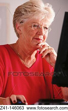 Stock Photo - senior woman with 
computer. fotosearch 
- search stock 
photos, pictures, 
images, and photo 
clipart