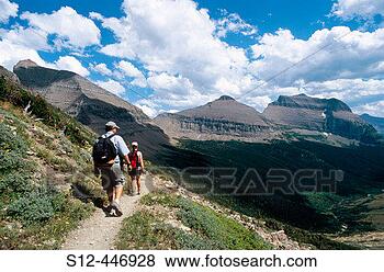 Stock Photo - hikers at piegan 
pass mt glacier 
national park 
usa. fotosearch 
- search stock 
photos, pictures, 
images, and photo 
clipart