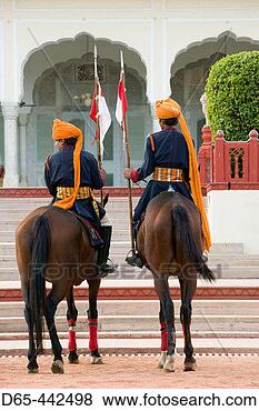 Stock Photo - rambagh palace 
hotel uniformed 
rajasthani horsemen 
jaipur rajasthan. 
fotosearch - search 
stock photos, 
pictures, images, 
and photo clipart