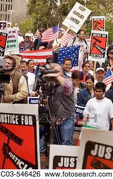 Stock Photo - television news 
cameramen cover 
a demonstration 
supporting amnesty. 
fotosearch - search 
stock photos, 
pictures, images, 
and photo clipart