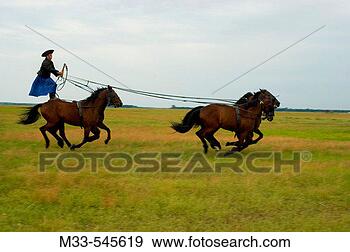 Stock Photograph - farmer with traditional 
hungarian dress 
big plain hortobágy 
national. fotosearch 
- search stock 
photos, pictures, 
images, and photo 
clipart