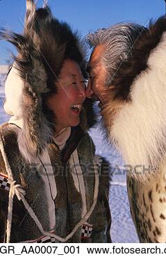 Stock Photography - inupiat eskimo 
man & woman rubbing 
noses nome ak 
winter. fotosearch 
- search stock 
photos, pictures, 
images, and photo 
clipart