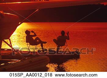 Stock Photo - sunset silhouette 
fishing from dock 
on lake kp ak. 
fotosearch - search 
stock photos, 
pictures, images, 
and photo clipart