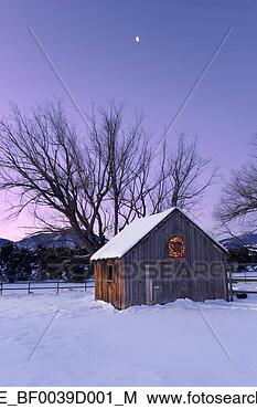 Stock Photo - wood barn w/lighted 
holiday wreath 
on farm @ dusk 
arkansas valley. 
fotosearch - search 
stock photos, 
pictures, images, 
and photo clipart