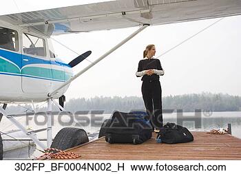 Banco de Imagem - comercial,   femininas, 
  piloto,   preps, 
  cessna,   185. 
fotosearch - busca 
de fotos, imagens 
e clipart