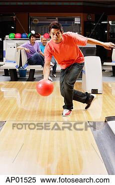 Stock Image - man bowling, people 
watching in the 
background. fotosearch 
- search stock 
photos, pictures, 
images, and photo 
clipart