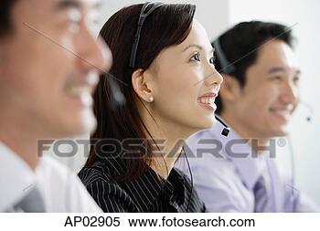 Stock Image - executives in 
a row, wearing 
headsets, looking 
away. fotosearch 
- search stock 
photos, pictures, 
images, and photo 
clipart