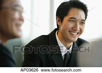 Stock Photo - businessman smiling, 
selective focus. 
fotosearch - search 
stock photos, 
pictures, images, 
and photo clipart