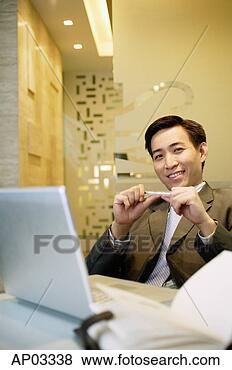 Stock Photo - businessman standing 
with arm outstretched 
and hand in pocket. 
fotosearch - search 
stock photos, 
pictures, images, 
and photo clipart