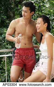 Stock Photo - couple in casual 
clothing, looking 
away. fotosearch 
- search stock 
photos, pictures, 
images, and photo 
clipart