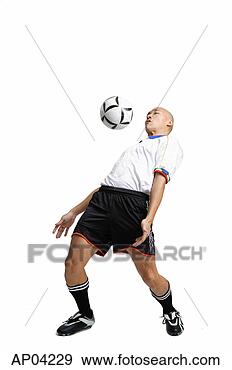 Hazır Fotoğraf - küçük,  adam, 
 futbol,  üniforma, 
 isabet,  top, 
 onunki,  göğüs. 
fotosearch - foto, 
resim, görüntü 
ve foto klipart 
ara
