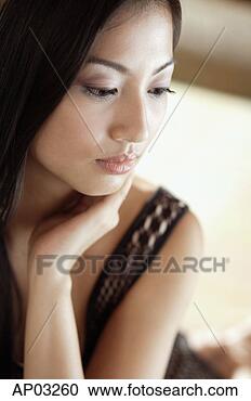 Stock Photography - woman looking 
away, portrait. 
fotosearch - search 
stock photos, 
pictures, images, 
and photo clipart