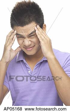 Stock Photo - man holding fingers 
to temples, grimacing. 
fotosearch - search 
stock photos, 
pictures, images, 
and photo clipart