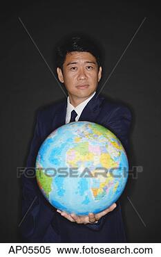 Stock Image - businessman holding 
globe. fotosearch 
- search stock 
photos, pictures, 
images, and photo 
clipart