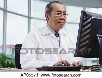 Stock Photography - doctor in office, 
using desktop 
computer. fotosearch 
- search stock 
photos, pictures, 
images, and photo 
clipart