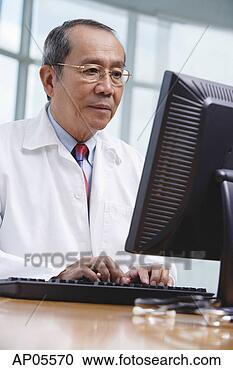 Stock Photography - doctor using desktop 
computer. fotosearch 
- search stock 
photos, pictures, 
images, and photo 
clipart