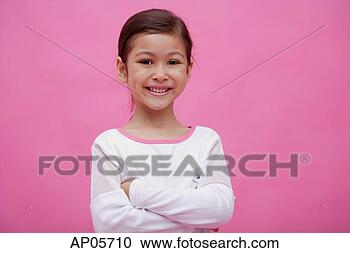 Stock Photography - girl looking at 
camera, arms crossed, 
smiling. fotosearch 
- search stock 
photos, pictures, 
images, and photo 
clipart