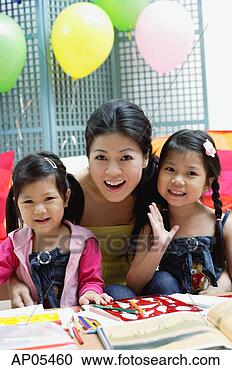 Stock Photography - mother and two 
daughters, portrait. 
fotosearch - search 
stock photos, 
pictures, images, 
and photo clipart