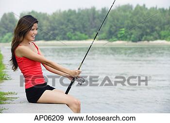 Stock Photograph - woman with fishing 
rod. fotosearch 
- search stock 
photos, pictures, 
images, and photo 
clipart