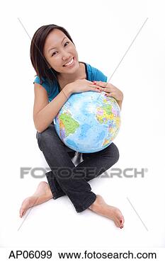 Stock Photograph - woman holding 
globe, sitting 
cross-legged. 
fotosearch - search 
stock photos, 
pictures, images, 
and photo clipart